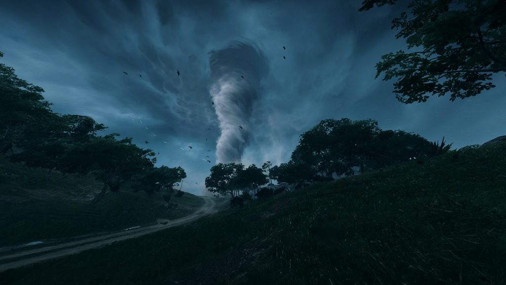 Battlefield 2042 - Une tornade se déplace au loin en haut d'une colline.