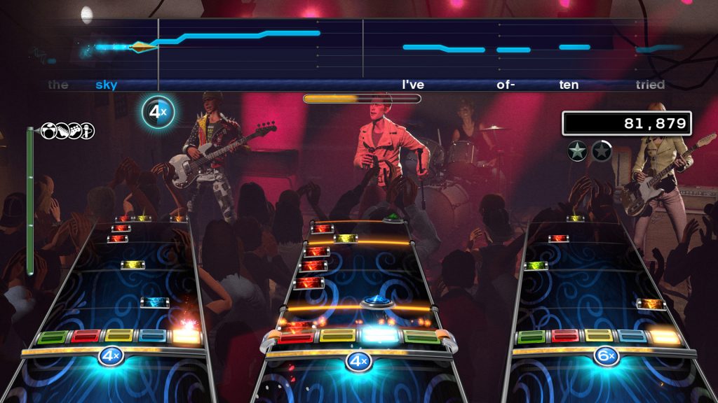 Capture d'écran d'une partie de Rock Band 4. On y voit les notes défiler à l'écran.