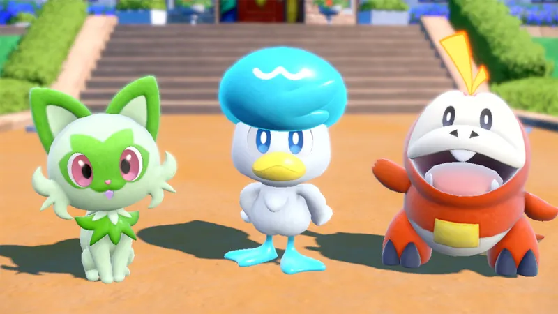 Les trois starters de Pokémon Écarlate et Violet devant l'académie de Paldea