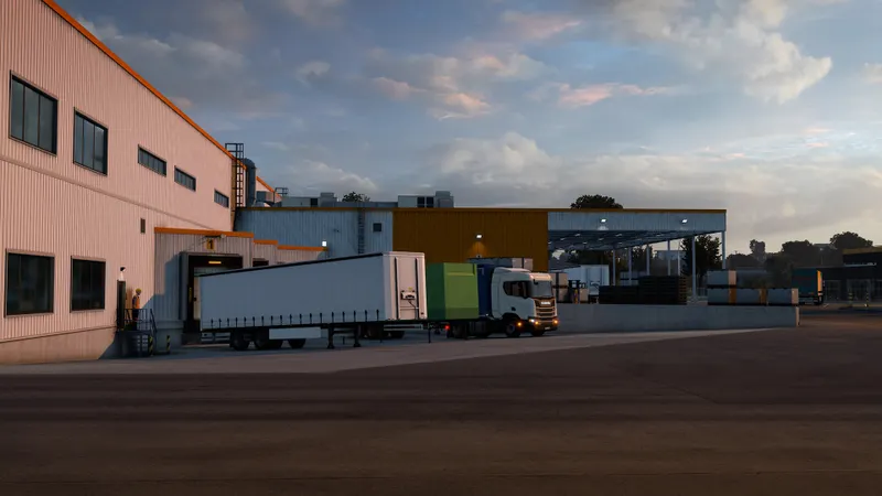 Camion personnalisé de Euro Truck Simulator 2 stationné devant un garage avant une nouvelle livraison