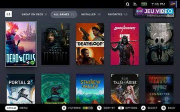 Steam Deck OLED de face avec éclairage rouge et cyan pour préparer des réglages FPS et batterie