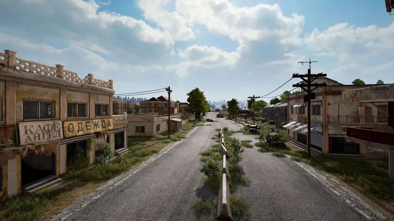 Rue d Erangel dans PUBG avec bâtiments et lignes de tir pour préparer une rotation à couvert vers la prochaine zone