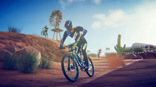 Descendeur de VTT dévalant une piste montagneuse dans Descenders, visuel officiel pour identifier le jeu avant de chercher un code PS5