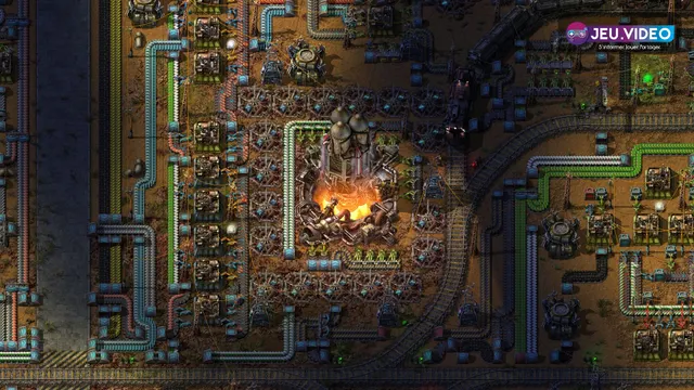 Base avancée de Factorio avec rails, tapis et fusée, utilisée comme image de couverture pour un guide trains débutant