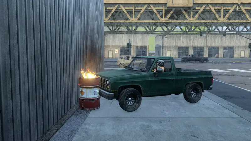 Pickup verde e barile in fiamme sotto una struttura metallica in Z1 Battle Royale