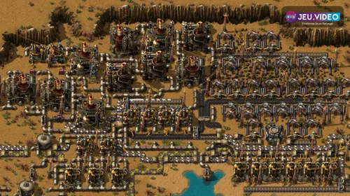 Zone pétrolière de Factorio avec raffineries usines chimiques et tuyaux pour préparer un bloc pétrole stable