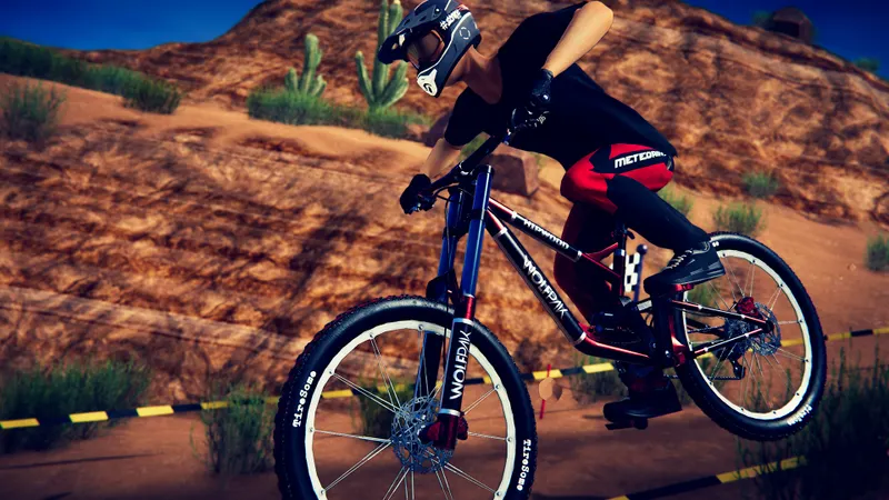 Pilote de Descenders effectuant un saut sur une piste enneigée, activité de jeu à privilégier en l’absence de code PS5