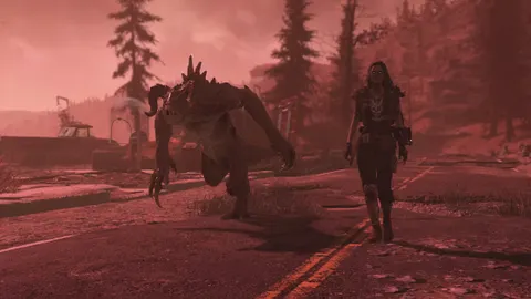 Fallout 76 World Pets : un Goule et son Deathclaw avancent sur une route