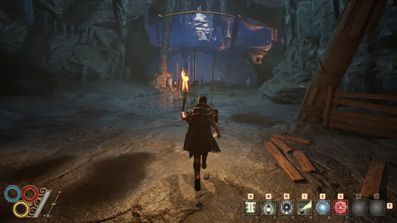 Capture officielle de Outward 2 avec un aventurier portant une torche dans une grotte
