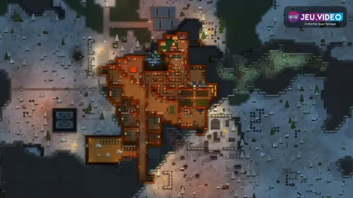 Colonie RimWorld avec champs, réserves et bâtiments organisés autour d’un frigo alimentaire débutant