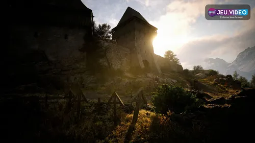 The Blood of Dawnwalker gameplay montre une forteresse baignée de lumière au cœur du monde ouvert