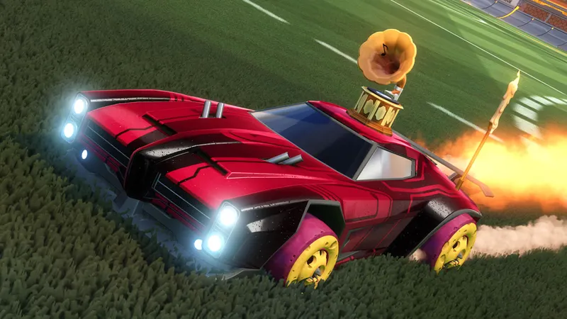 Voiture Dominus rouge dans Rocket League sur une pelouse de stade