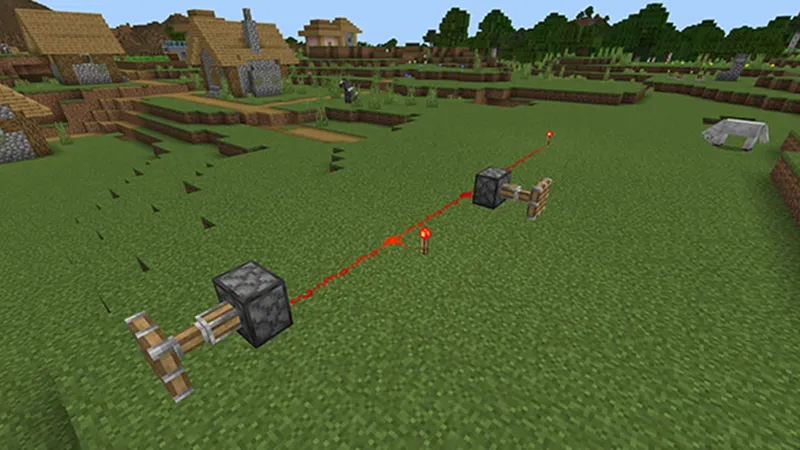 Circuit de Minecraft à plusieurs branches, illustrant les entrées arrière et latérales d’un comparateur.