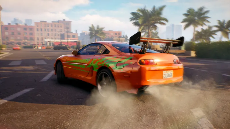 Voiture orange de Stuntman Hollywood en drift dans une rue ensoleillée