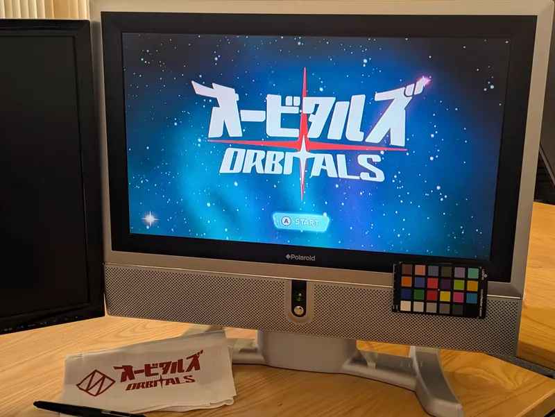 Logo de Orbitals lié au développement chez Shapefarm