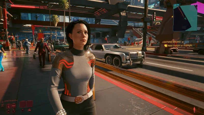 Capture officielle de Cyberpunk 2077 montrant une rue de Night City en plein jour