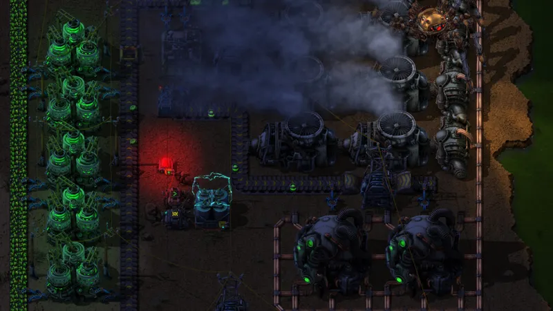 Zone industrielle Factorio avancée où les balises demandent une énergie stable
