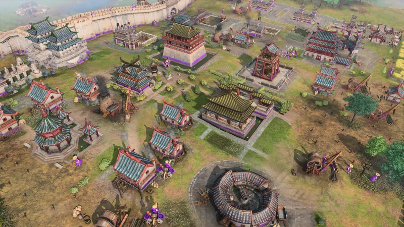 Bâtiments de production d’Age of Empires IV visibles dans une base pour appliquer la sélection multiple et les groupes de contrôle
