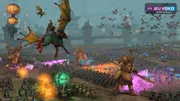 Bataille de Total War WARHAMMER III montrant des armées en formation sur un terrain ouvert.