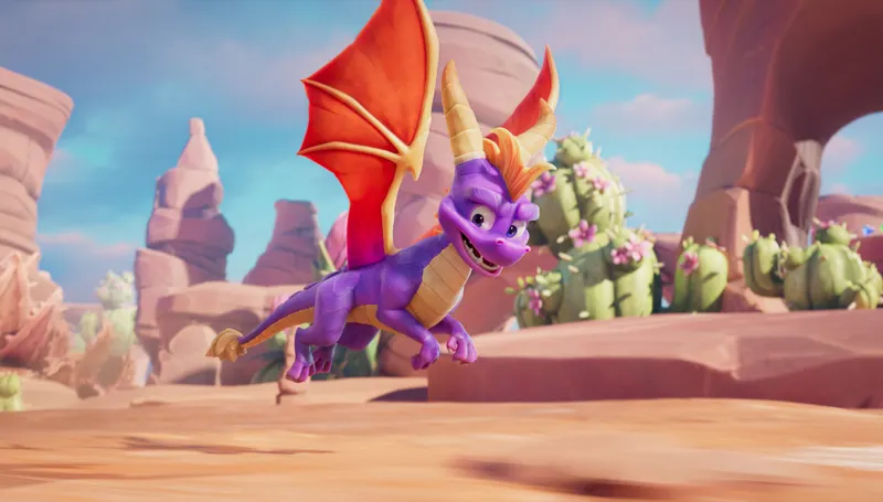 Spyro A Realm Beyond montrant Spyro en vol dans un décor désertique coloré